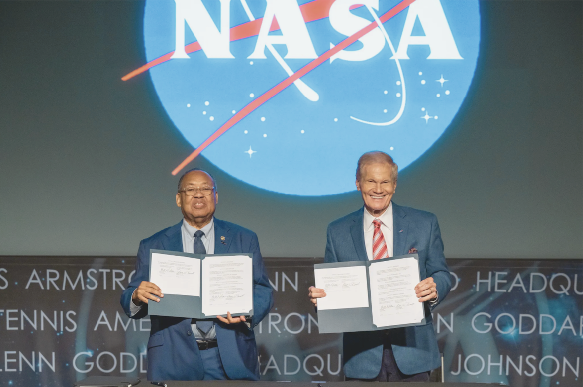 NAACP Chair Leon Russell and NASA Administrator Bill Nelson sign a Space Act Agreement at NASA HQ